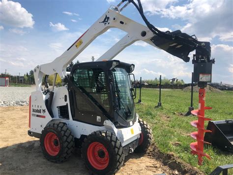 post auger skid steer|skid steer with auger attachment.